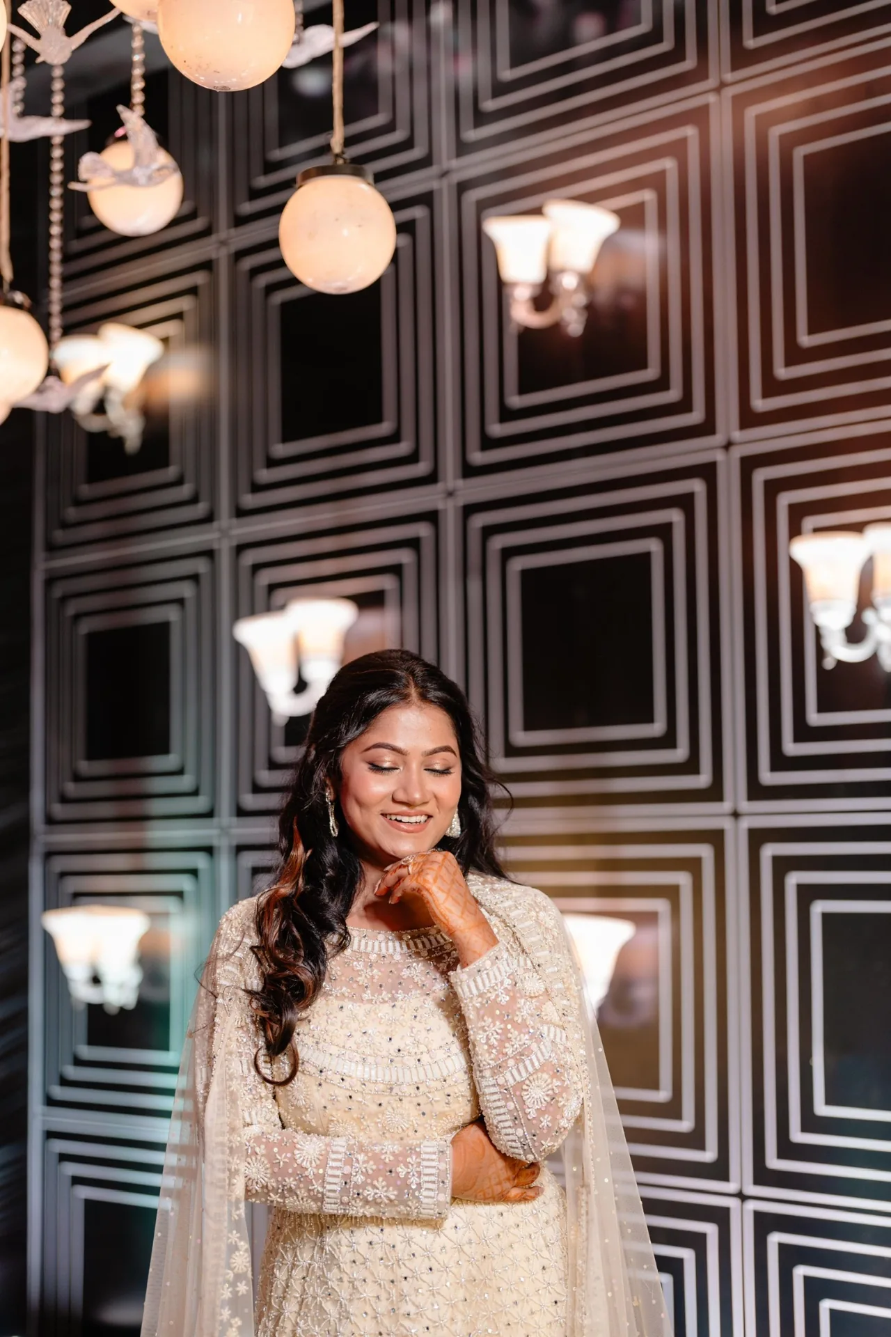 Anisha — bridal makeup in Bhubaneswar by Romma, soft chandelier light