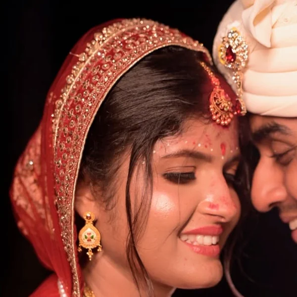 Pratyasha smiling as a bride — natural bridal makeup by Romma, Cuttack